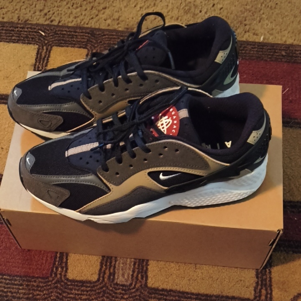 Nike Black and Gray Sneakers with Sporty Design